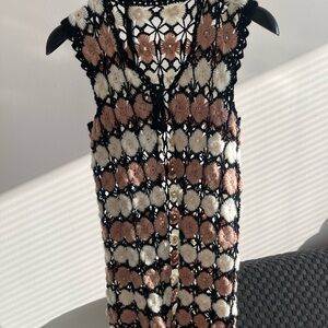 Crochet Sleeveless Top with Floral Pattern